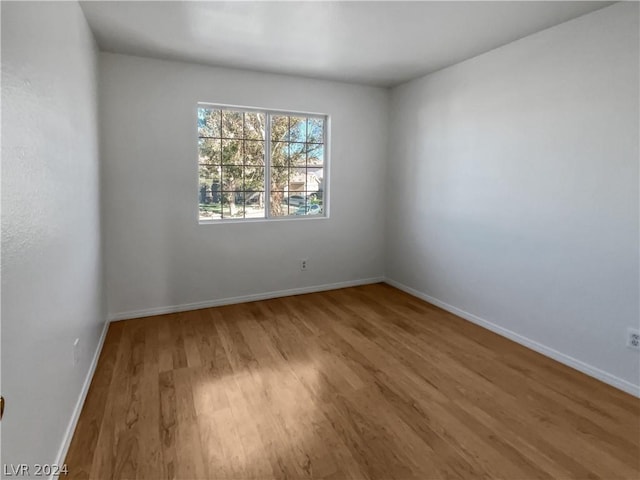 empty room featuring hardwood / wood-style floors