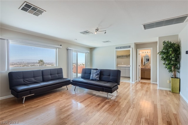 living room featuring light wood-type flooring