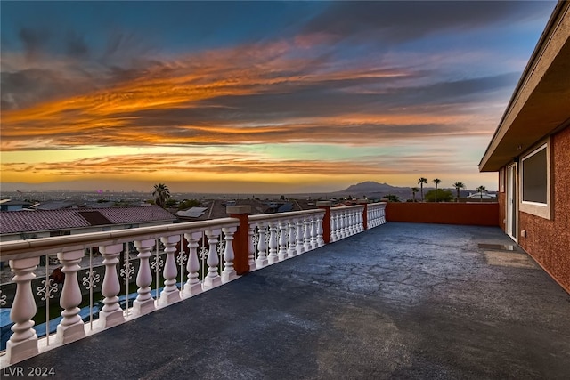 patio terrace at dusk with a balcony