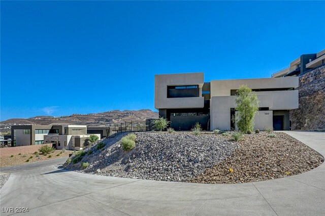 view of front of home with a mountain view