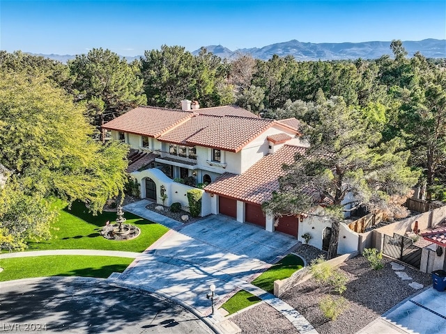 drone / aerial view featuring a mountain view