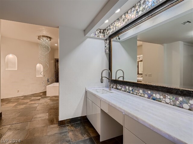 bathroom featuring tile flooring and vanity