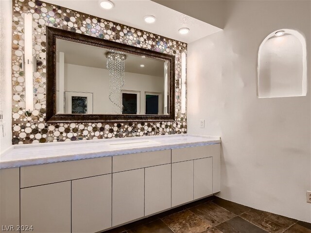 bathroom featuring tile floors and vanity