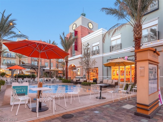 exterior space featuring an outdoor living space and a patio