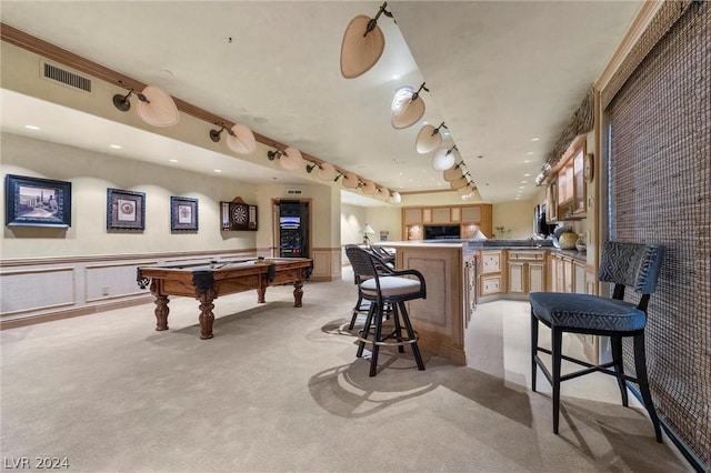 interior space with light carpet, pool table, rail lighting, and light brown cabinets