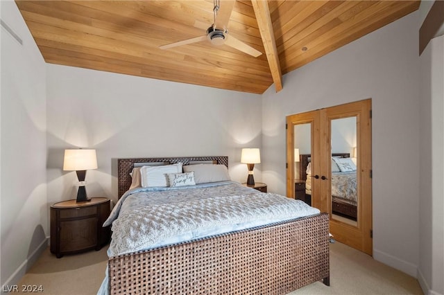 carpeted bedroom with vaulted ceiling, wooden ceiling, french doors, and ceiling fan