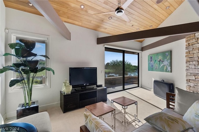 tiled living room with ceiling fan, wooden ceiling, and vaulted ceiling with beams