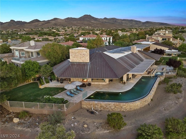 bird's eye view with a mountain view