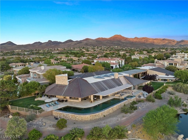 aerial view featuring a mountain view