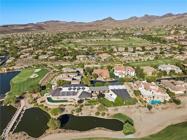 bird's eye view with a water and mountain view