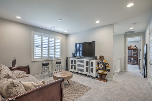 living room featuring light colored carpet