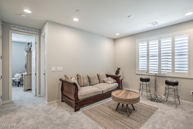 living room with light colored carpet