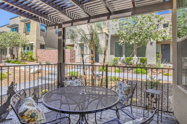 view of patio featuring a pergola