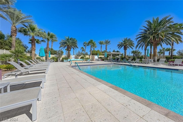 community pool with a patio