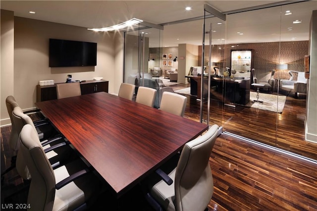 dining space with dark wood-style flooring and recessed lighting