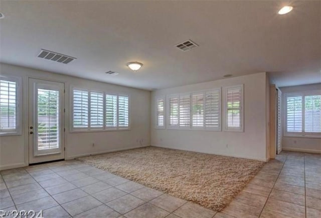 view of tiled spare room