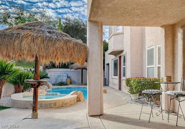 view of patio with a fenced in pool