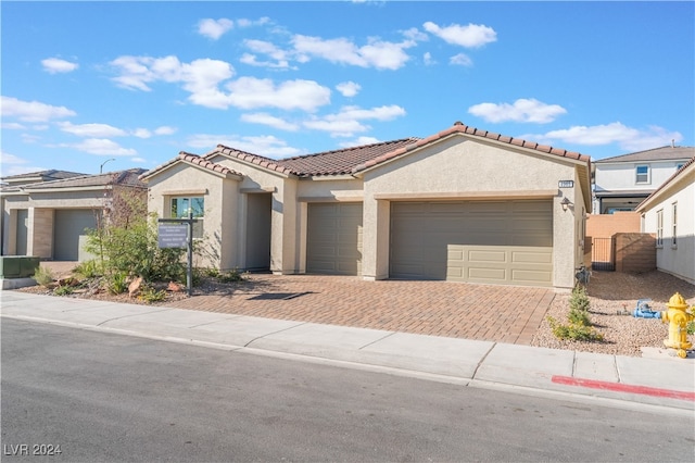 view of front of property with a garage