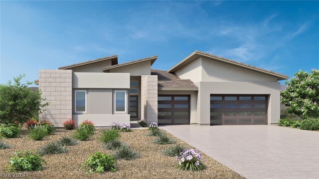 view of front of home with a garage