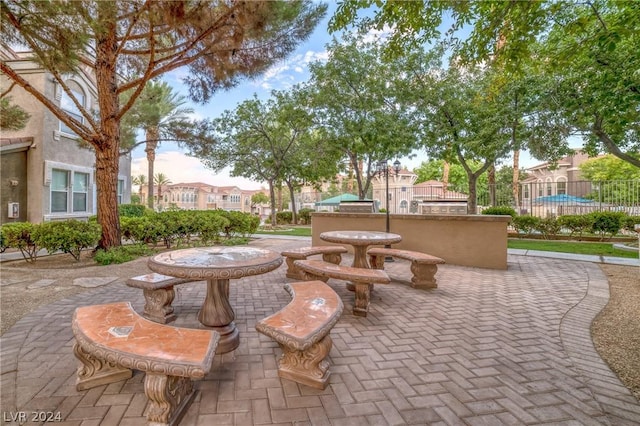 view of home's community with a patio area