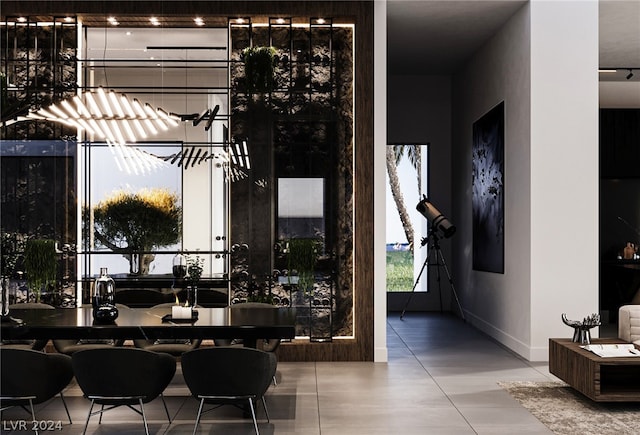 dining area featuring light tile patterned floors