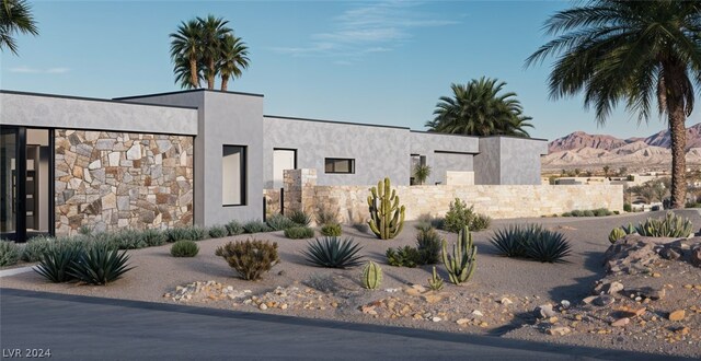 view of front of house with a mountain view