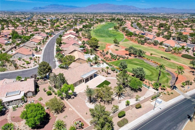 birds eye view of property featuring a mountain view