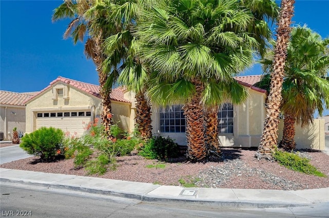 view of front of property featuring a garage