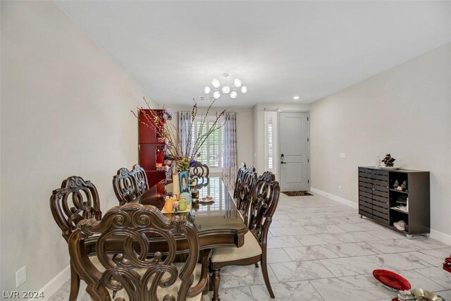 8373 Bartholomew Park Ct, Las Vegas, NV 89139 - dining space with baseboards and marble finish floor