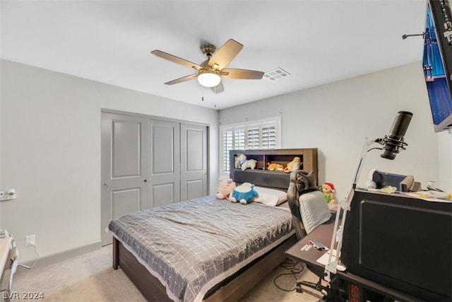 8373 Bartholomew Park Ct, Las Vegas, NV 89139 - bedroom with carpet floors, a closet, a ceiling fan, and visible vents