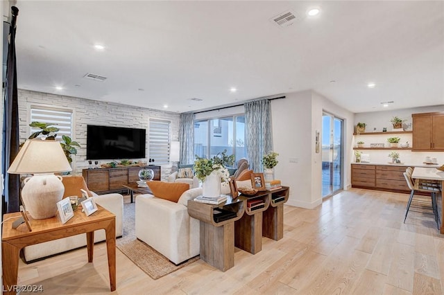 living room with light hardwood / wood-style flooring