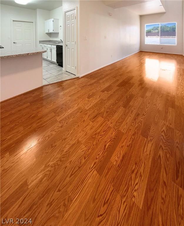 unfurnished living room with light hardwood / wood-style flooring