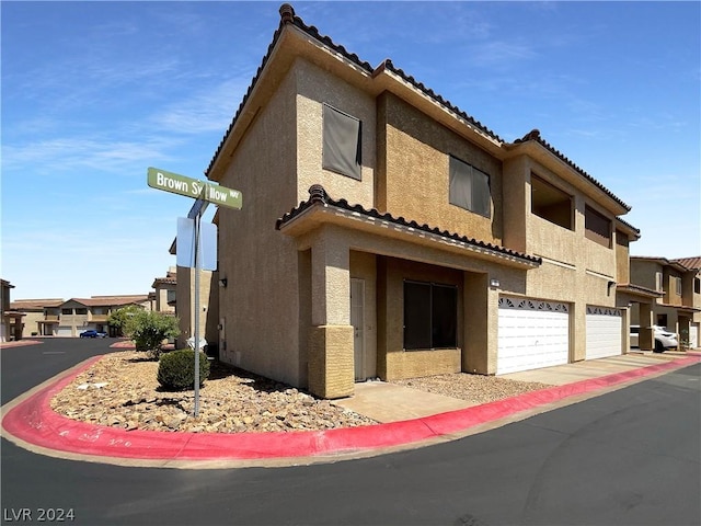 view of front of property featuring a garage