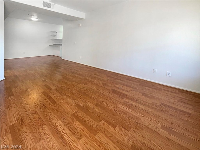 empty room with light hardwood / wood-style floors