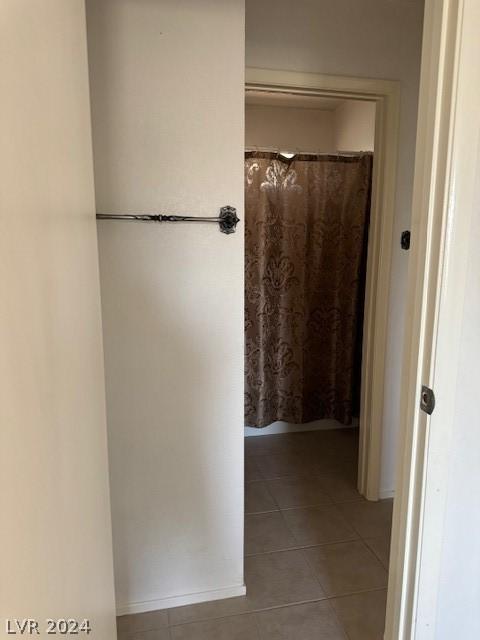 bathroom featuring tile floors