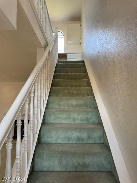 stairs with carpet floors