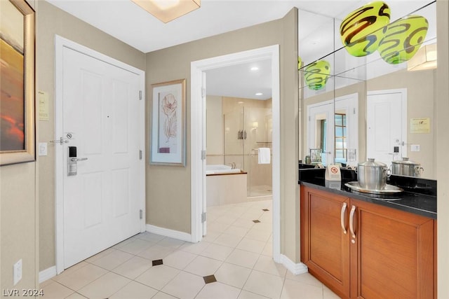 entrance foyer featuring light tile patterned floors