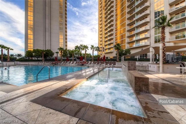 view of pool featuring a patio and pool water feature