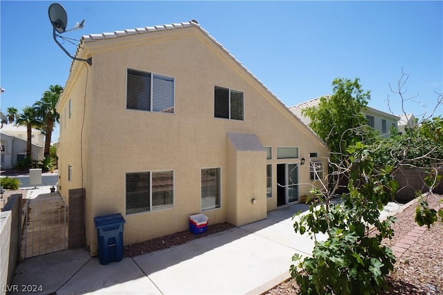 rear view of property with a patio