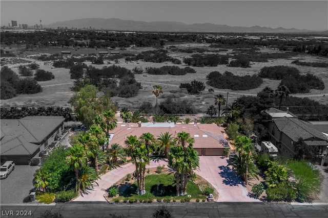 drone / aerial view featuring a mountain view