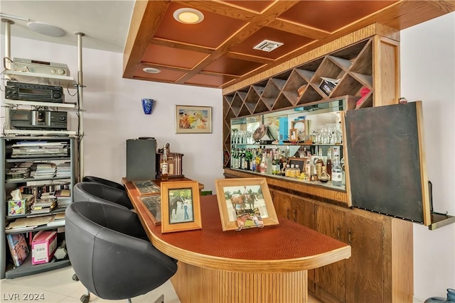 bar featuring light tile patterned flooring