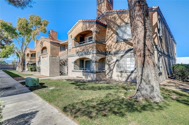 view of property with central AC