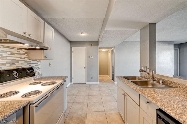 kitchen with white range with electric stovetop, tasteful backsplash, dishwasher, light tile patterned floors, and a textured ceiling