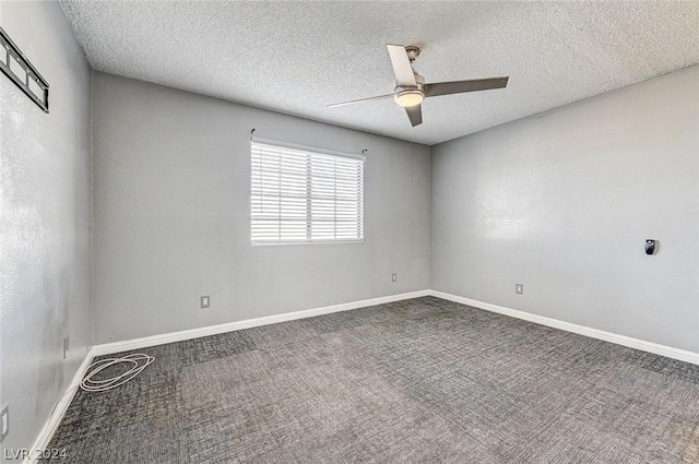 empty room featuring carpet floors, a textured ceiling, and ceiling fan