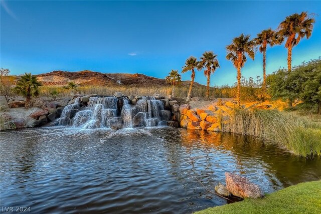 property view of water featuring a mountain view