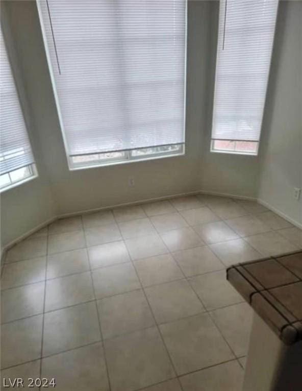 empty room featuring light tile patterned flooring