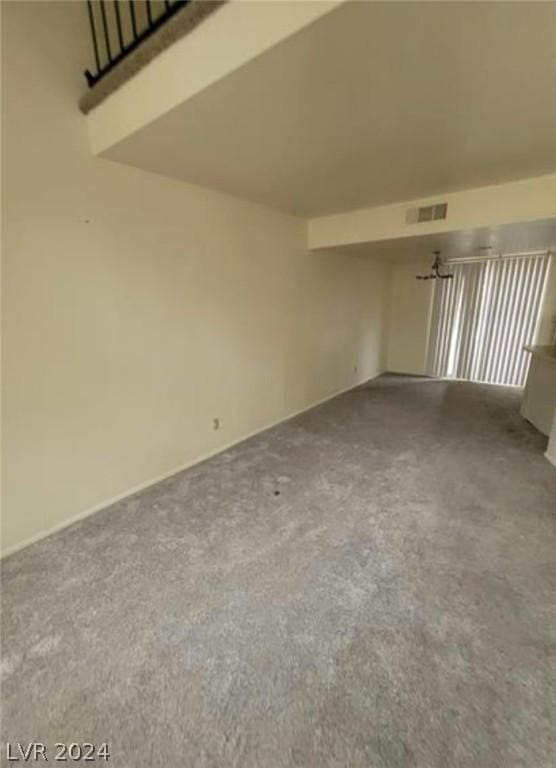 spare room featuring carpet