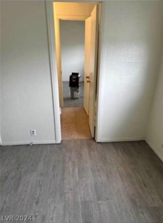 spare room featuring hardwood / wood-style flooring