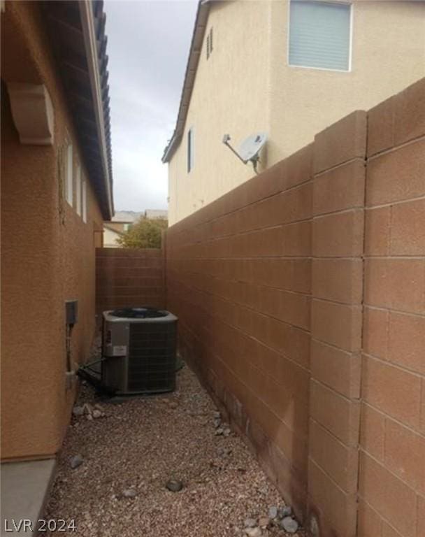 view of home's exterior with central AC unit