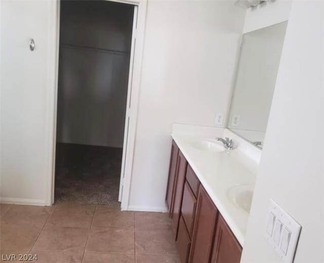 bathroom featuring tile patterned floors and vanity